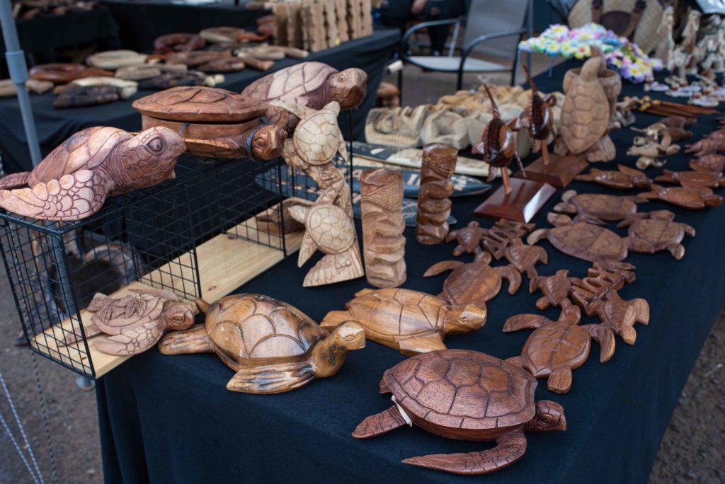 Turtle and Tiki Carvings at Napili Farmers Market on Maui